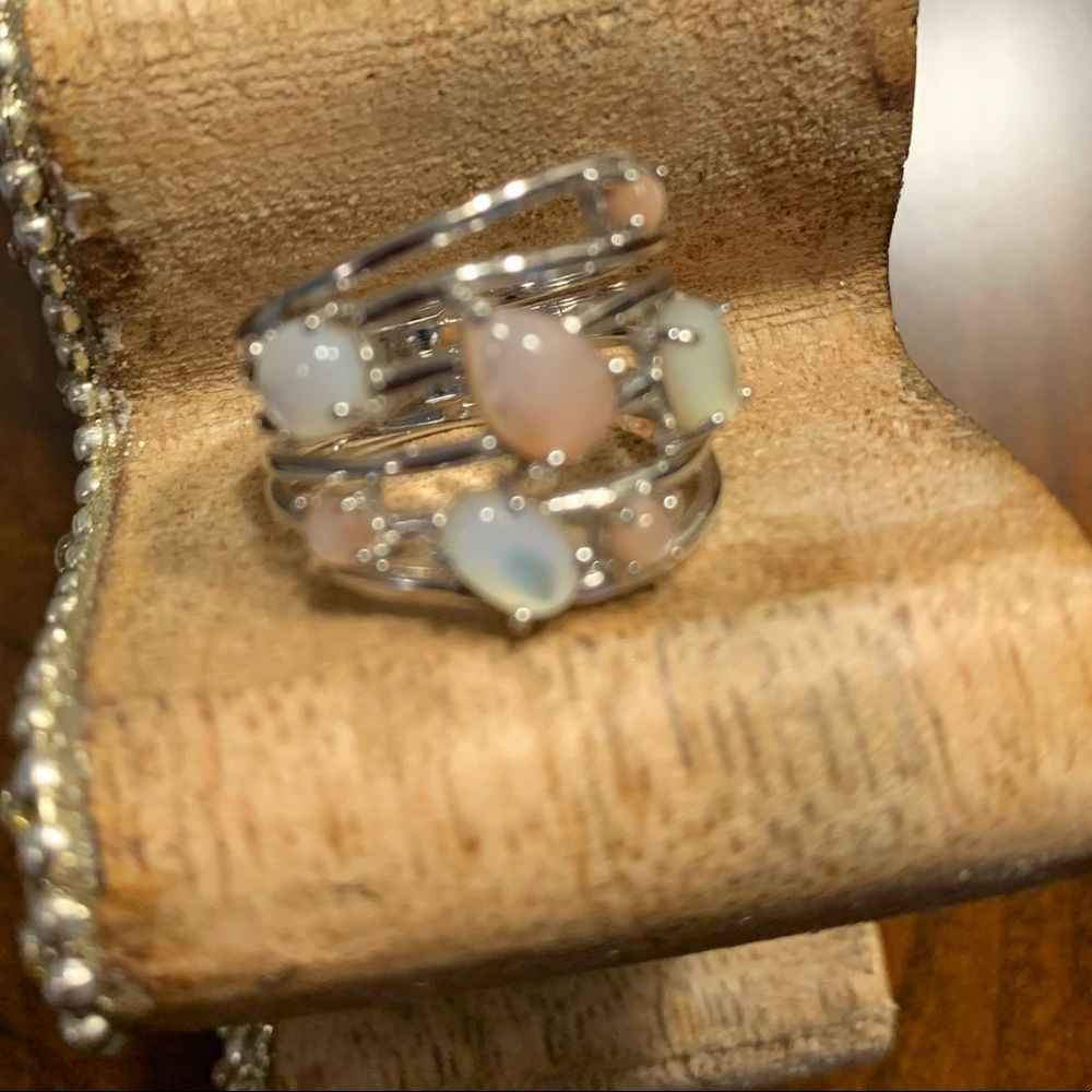 Silver toned Ring with Pearlized Stones